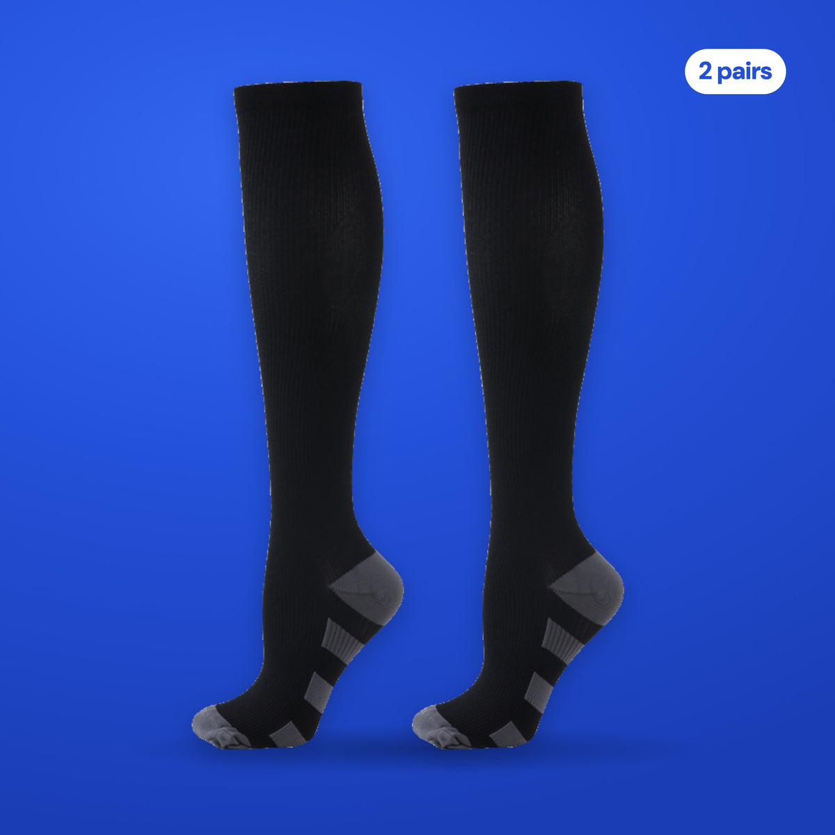 Two black knee high Compression Socks on a cobalt background, 2 pairs in every pack