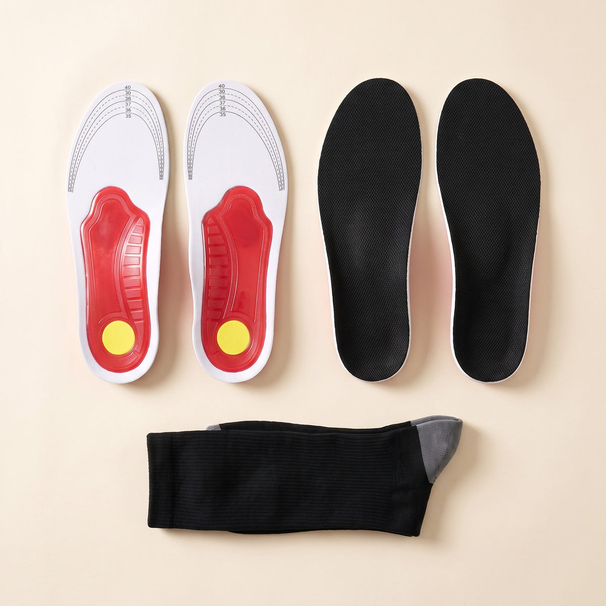 Two pairs of Arch Support Insoles with a free pair of compression socks
