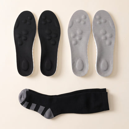 Two pairs of SoftInch Comfort Insoles in black and gray with a free pair of compression socks